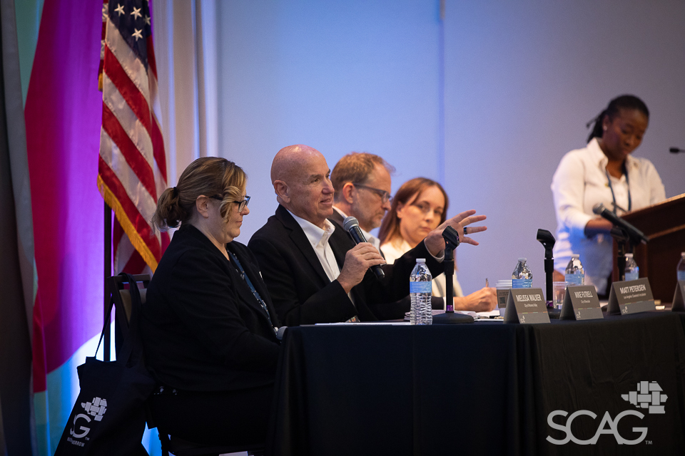 Breakout session panelists discussing mobility solutions.