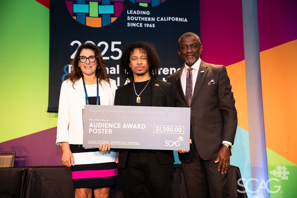 Cindy Allen and Kome Ajise with a Student Showcase winner.